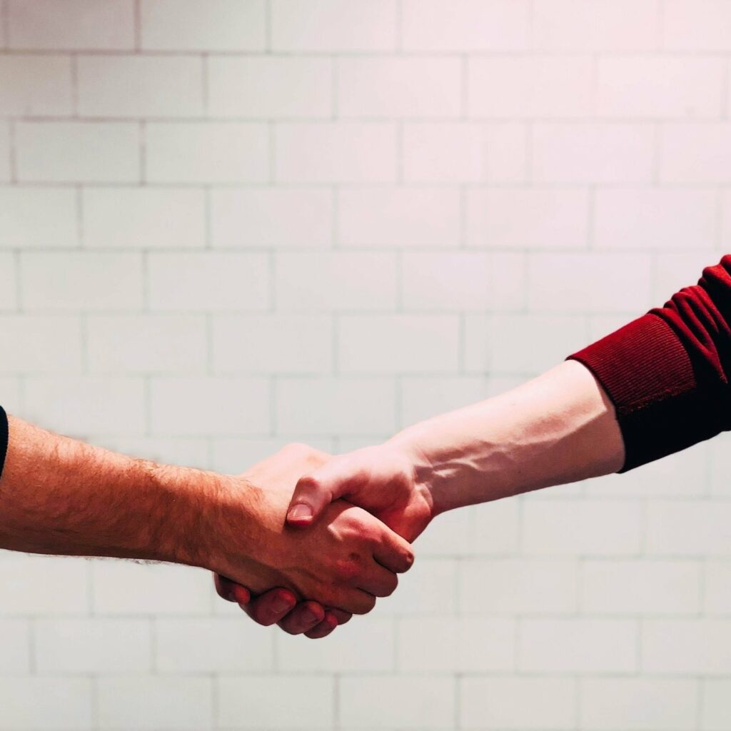 two men shaking hands
